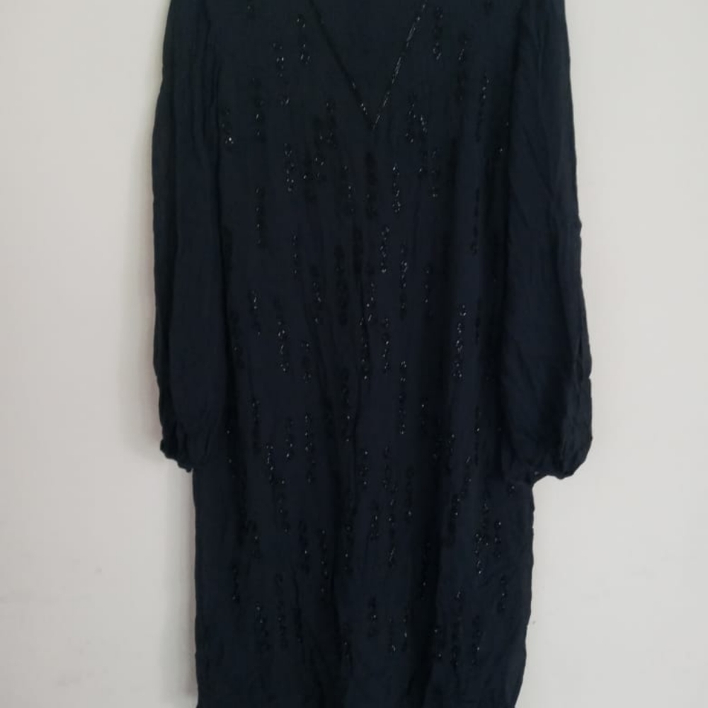Blue black sequence dress.